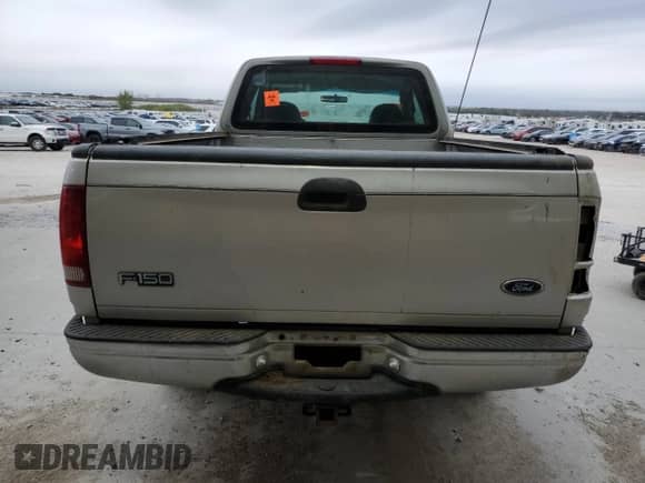 1998 Ford F-150 z VIN 1FTZX186XWKB26199, wystawiony jako Copart lot #84998095 z przebiegiem 75 585 mil mil oraz Czysty tytuł • Clean title. Historia ofert i sprzedaży dostępna na DreamBid. Obrazek 6.