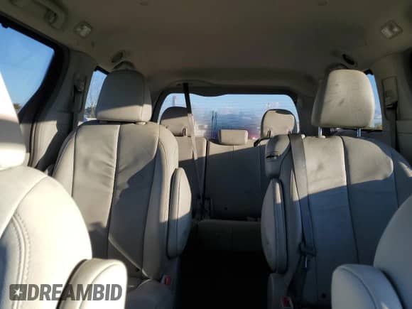2012 Toyota Sienna XLE with VIN 5TDYK3DC5CS245235, listed as a Copart auction lot 82349425 with 149,275 mi miles and Salvage title. Bid and sale history available at DreamBid. Image 10.