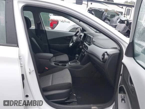 2020 Hyundai Kona SE with VIN KM8K1CAA9LU576287, listed as a IAAI auction lot 43016802 with 76,145 mi miles and . Bid and sale history available at DreamBid. Image 5.