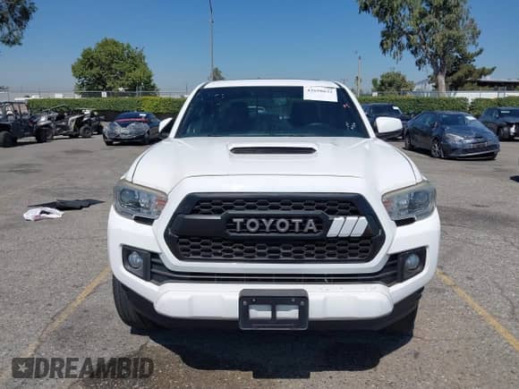2017 Toyota Tacoma SR5 with VIN 3TMAZ5CN1HM037971, listed as a IAAI auction lot 42658632 with 67,228 mi miles and . Bid and sale history available at DreamBid. Image 6.