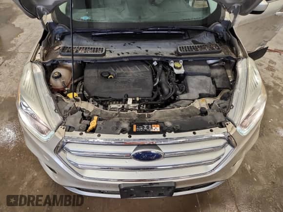 2017 Ford Escape SE с VIN 1FMCU9GD7HUC21075, выставлен на аукционе Copart как лот 82115645 с пробегом 91 949 миль миль и На запчасти • Non repairable. История ставок и продаж доступна на DreamBid. Изображение 12.