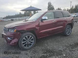 2017 Jeep Grand Cherokee Overland z VIN 1C4RJFCG1HC815737, wystawiony jako Copart lot #90295465 z przebiegiem 123 572 mil mil oraz Szkoda całkowita • Salvage title. Historia ofert i sprzedaży dostępna na DreamBid. Obrazek 1.