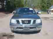 2009 Nissan Frontier SE with VIN 1N6AD09WX9C401340, listed as a IAAI auction lot 43170418 with 212,858 mi miles and . Bid and sale history available at DreamBid. Image 12.