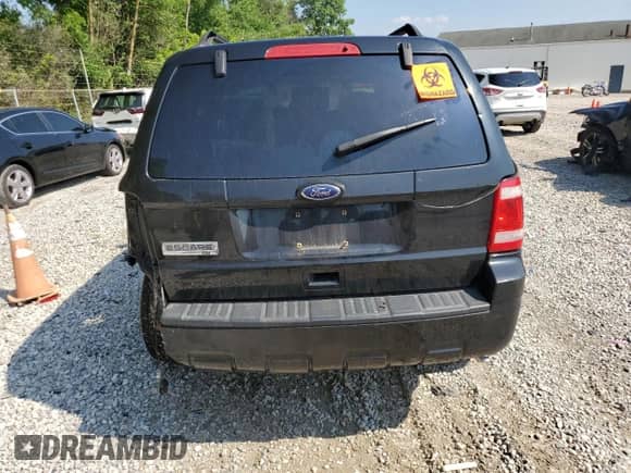 2011 Ford Escape XLT с VIN 1FMCU9D71BKA79811, выставлен на аукционе Copart как лот 63732235 с пробегом 240 338 миль миль и Списание • Salvage title. История ставок и продаж доступна на DreamBid. Изображение 6.