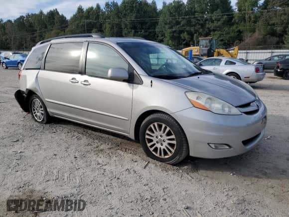 2010 Toyota Sienna XLE с VIN 5TDYK4CC8AS339789, выставлен на аукционе Copart как лот 85838045 с пробегом 178 977 миль миль и Списание • Salvage title. История ставок и продаж доступна на DreamBid. Изображение 4.