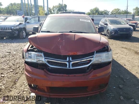 2013 Dodge Journey American Value с VIN 3C4PDCAB8DT647288, выставлен на аукционе Copart как лот 84297845 с пробегом 166 060 миль миль и Списание • Salvage title. История ставок и продаж доступна на DreamBid. Изображение 5.