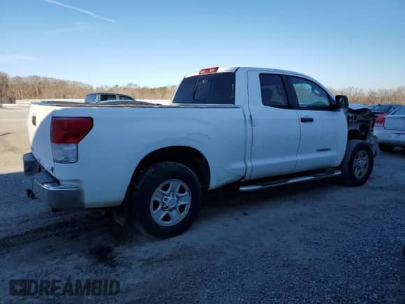 2012 Toyota Tundra z VIN 5TFRU5F1XCX027582, wystawiony jako Copart lot #85649634 z przebiegiem 267 030 mil mil oraz Szkoda całkowita • Salvage title. Historia ofert i sprzedaży dostępna na DreamBid. Obrazek 3.
