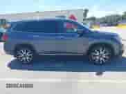 2020 Honda Pilot Touring 8-Passenger z VIN 5FNYF5H90LB000801, wystawiony jako IAAI lot #41865605 z przebiegiem 62 743 mil mil oraz . Historia ofert i sprzedaży dostępna na DreamBid. Obrazek 13.