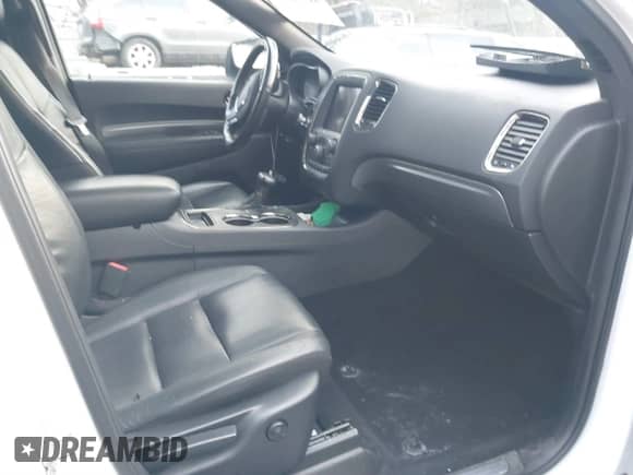 2019 Dodge Durango GT with VIN 1C4RDJDG5KC833738, listed as a IAAI auction lot 41570422 with 57,259 mi miles and . Bid and sale history available at DreamBid. Image 5.