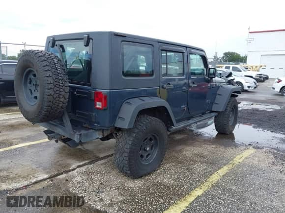 2008 Jeep Wrangler Unlimited X z VIN 1J4GA39198L529900, wystawiony jako IAAI lot #43056730 z przebiegiem 145 039 mil mil oraz . Historia ofert i sprzedaży dostępna na DreamBid. Obrazek 4.