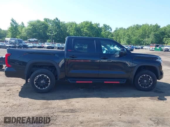2022 Toyota Tundra SR5 with VIN 5TFLA5DB9NX009104, listed as a IAAI auction lot 42536638 with 77,485 mi miles and . Bid and sale history available at DreamBid. Image 13.