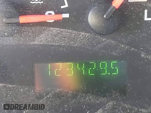 2004 Ford Econoline Cargo with VIN 1FTRE14W44HA29084, listed as a IAAI auction lot 41793350 with 123,429 mi miles and . Bid and sale history available at DreamBid. Image 15.