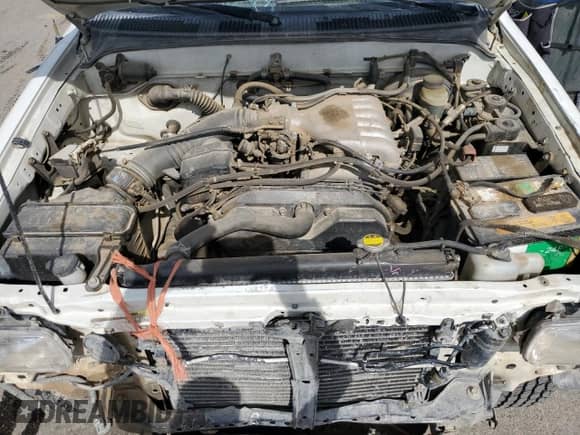 1997 Toyota Tacoma z VIN 4TAWN72N4VZ239482, wystawiony jako Copart lot #56564145 z przebiegiem 151 318 mil mil oraz Szkoda całkowita • Salvage title. Historia ofert i sprzedaży dostępna na DreamBid. Obrazek 11.