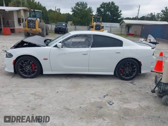 2022 Dodge Charger Scat Pack с VIN 2C3CDXGJ8NH210345, выставлен на аукционе IAAI как лот 43180123 с пробегом 49 700 миль миль и . История ставок и продаж доступна на DreamBid. Изображение 13.