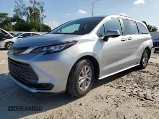 2021 Toyota Sienna LE with VIN 5TDBSKFC5MS019968, listed as a Copart auction lot 80933695 with 86,095 mi miles and Salvage title. Bid and sale history available at DreamBid. Image 1.