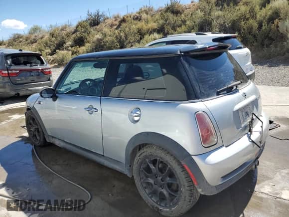 2006 MINI Hardtop S with VIN WMWRE33586TJ37385, listed as a Copart auction lot 67606184 with 78,671 mi miles and Salvage title. Bid and sale history available at DreamBid. Image 2.