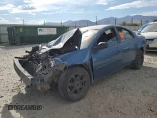 2002 Dodge Neon ES with VIN 1B3ES56C62D616040, listed as a Copart auction lot 76139824 with Not provided miles and Salvage title. Bid and sale history available at DreamBid. Image 1.