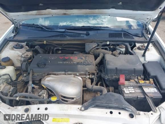 2002 Toyota Camry LE z VIN 4T1BE32K52U054301, wystawiony jako IAAI lot #42509651 z przebiegiem 290 481 mil mil oraz . Historia ofert i sprzedaży dostępna na DreamBid. Obrazek 10.