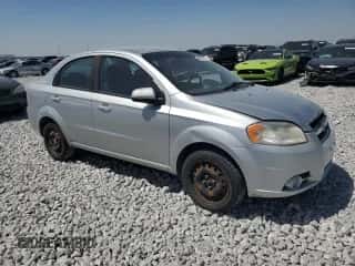 2011 Chevrolet Aveo 2LT z VIN KL1TG5DE0BB185998, wystawiony jako Copart lot #69419664 z przebiegiem 163 949 mil mil oraz Szkoda całkowita • Salvage title. Historia ofert i sprzedaży dostępna na DreamBid. Obrazek 4.