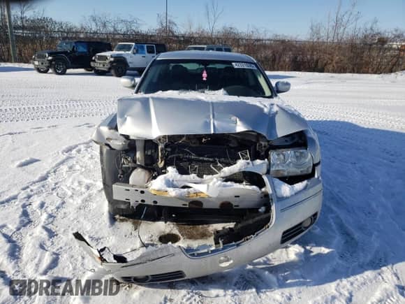 2009 Chrysler 300 Touring с VIN 2C3KA53V09H642371, выставлен на аукционе Copart как лот 42331035 с пробегом Не указан миль и Списание • Salvage title. История ставок и продаж доступна на DreamBid. Изображение 5.