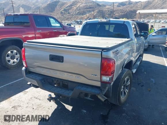 2017 Toyota Tacoma SR5 with VIN 3TMBZ5DNXHM006608, listed as a IAAI auction lot 43412044 with 114,937 mi miles and . Bid and sale history available at DreamBid. Image 4.