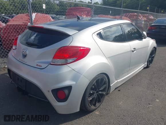 2014 Hyundai Veloster Turbo with VIN KMHTC6AE8EU211248, listed as a IAAI auction lot 43078232 with 184,148 mi miles and . Bid and sale history available at DreamBid. Image 4.