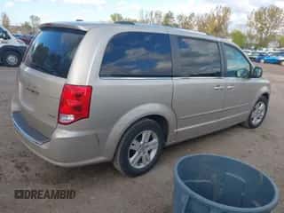 2012 Dodge Grand Caravan Crew with VIN 2C4RDGDG0CR359757, listed as a IAAI auction lot 43485394 with 84,105 mi miles and . Bid and sale history available at DreamBid. Image 4.