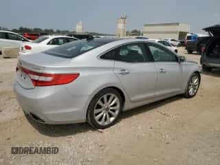 2014 Hyundai Azera Limited с VIN KMHFH4JG7EA398343, выставлен на аукционе Copart как лот 64888504 с пробегом 83 966 миль миль и Списание • Salvage title. История ставок и продаж доступна на DreamBid. Изображение 3.