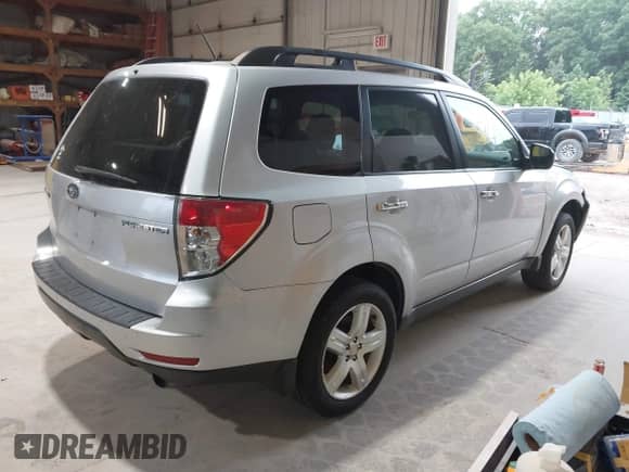 2009 Subaru Forester X with VIN JF2SH63619G728162, listed as a IAAI auction lot 42642594 with 182,451 mi miles and . Bid and sale history available at DreamBid. Image 4.