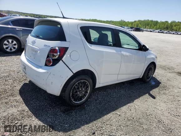 2013 Chevrolet Sonic LS с VIN 1G1JA6SH7D4120201, выставлен на аукционе Copart как лот 53231295 с пробегом 205 985 миль миль и Списание • Salvage title. История ставок и продаж доступна на DreamBid. Изображение 3.