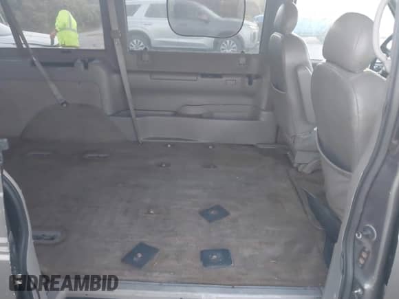 2003 Chevrolet Astro z VIN 1GNEL19X63B115821, wystawiony jako IAAI lot #41923632 z przebiegiem 107 341 mil mil oraz . Historia ofert i sprzedaży dostępna na DreamBid. Obrazek 8.