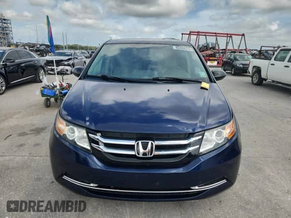 2015 Honda Odyssey LX with VIN 5FNRL5H24FB090989, listed as a Copart auction lot 85265575 with 129,952 mi miles and Salvage title. Bid and sale history available at DreamBid. Image 5.