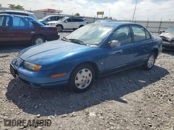 2001 Saturn SL with VIN 1G8ZH54861Z307192, listed as a Copart auction lot 58076335 with 96,157 mi miles and Salvage title. Bid and sale history available at DreamBid. Image 1.