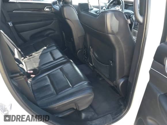 2018 Jeep Grand Cherokee Overland with VIN 1C4RJFCG7JC324708, listed as a IAAI auction lot 43294688 with 131,457 mi miles and . Bid and sale history available at DreamBid. Image 8.