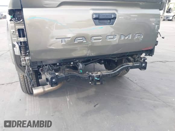 2024 Toyota Tacoma SR5 with VIN 3TMLB5JN1RM043397, listed as a IAAI auction lot 42181997 with 9,254 mi miles and . Bid and sale history available at DreamBid. Image 6.