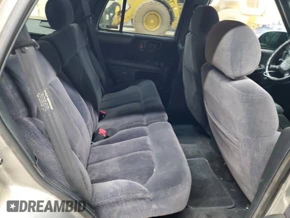 2001 Chevrolet Blazer LT z VIN 1GNDT13W712214351, wystawiony jako Copart lot #70259904 z przebiegiem 191 799 mil mil oraz Szkoda całkowita • Salvage title. Historia ofert i sprzedaży dostępna na DreamBid. Obrazek 11.