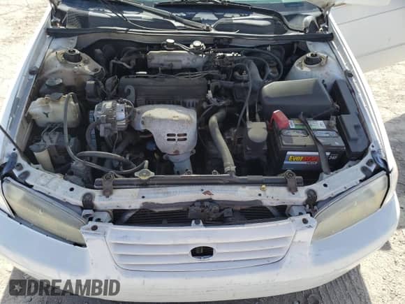 1998 Toyota Camry LE z VIN 4T1BG22K3WU357538, wystawiony jako Copart lot #82461865 z przebiegiem Nie podano mil oraz Czysty tytuł • Clean title. Historia ofert i sprzedaży dostępna na DreamBid. Obrazek 11.