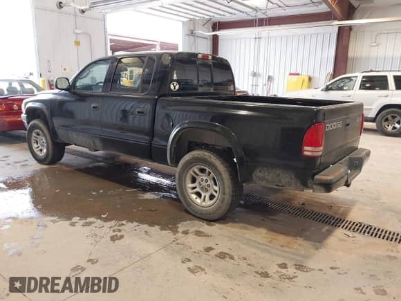 2003 Dodge Dakota Sport with VIN 1D7HG38N43S190674, listed as a IAAI auction lot 43512912 with 173,763 mi miles and . Bid and sale history available at DreamBid. Image 3.