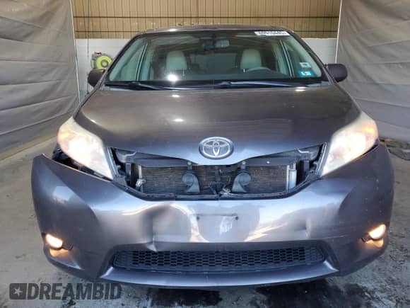 2012 Toyota Sienna XLE with VIN 5TDDK3DC9CS033551, listed as a Copart auction lot 69910445 with 210,288 mi miles and Salvage title. Bid and sale history available at DreamBid. Image 5.