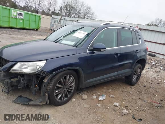 2011 Volkswagen Tiguan S with VIN WVGAV7AX7BW527670, listed as a IAAI auction lot 41189707 with 155,282 mi miles and . Bid and sale history available at DreamBid. Image 13.