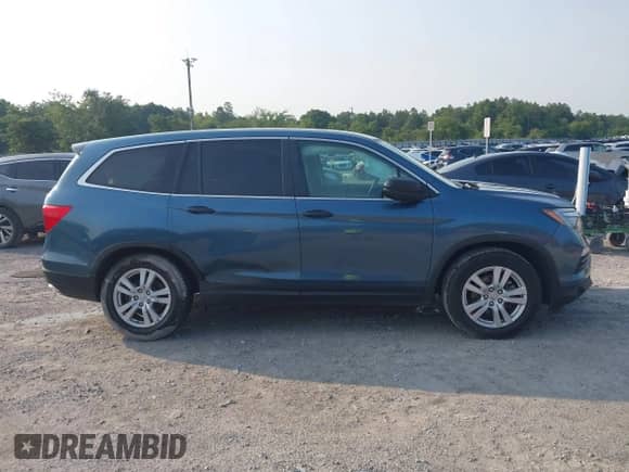 2016 Honda Pilot LX z VIN 5FNYF6H17GB092852, wystawiony jako IAAI lot #42406550 z przebiegiem 141 165 mil mil oraz . Historia ofert i sprzedaży dostępna na DreamBid. Obrazek 13.