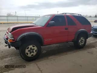 2001 Chevrolet Blazer LS с VIN 1GNCT18W71K247094, выставлен на аукционе Copart как лот 53748065 с пробегом 145 695 миль миль и Списание • Salvage title. История ставок и продаж доступна на DreamBid. Изображение 1.
