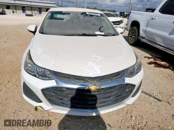 2019 Chevrolet Cruze with VIN 1G1BJ5SM5K7104098, listed as a Copart auction lot 70595035 with 128,620 mi miles and Clean title. Bid and sale history available at DreamBid. Image 5.