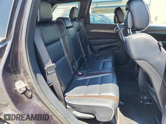 2015 Jeep Grand Cherokee High Altitude z VIN 1C4RJFCM5FC855631, wystawiony jako Copart lot #66723425 z przebiegiem 136 237 mil mil oraz Szkoda całkowita • Salvage title. Historia ofert i sprzedaży dostępna na DreamBid. Obrazek 11.