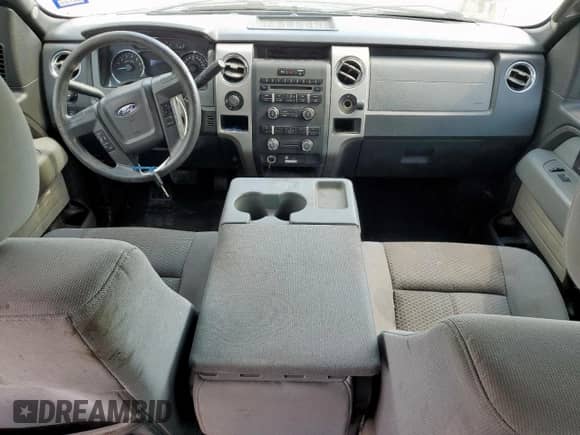 2013 Ford F-150 Lariat с VIN 1FTFW1EF1DFB01787, выставлен на аукционе Copart как лот 71152345 с пробегом 299 032 миль миль и Списание • Salvage title. История ставок и продаж доступна на DreamBid. Изображение 8.