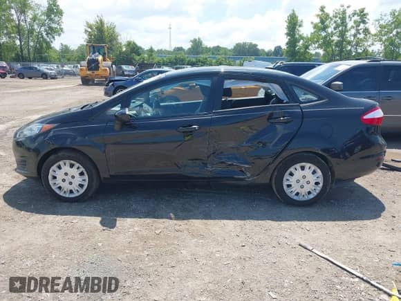 2014 Ford Fiesta S with VIN 3FADP4AJ7EM174119, listed as a IAAI auction lot 42862843 with 147,315 mi miles and . Bid and sale history available at DreamBid. Image 14.