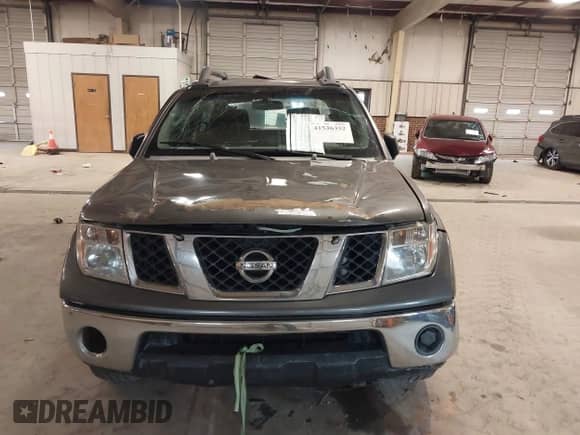 2006 Nissan Frontier LE with VIN 1N6AD07U76C414981, listed as a IAAI auction lot 41536352 with 217,560 mi miles and . Bid and sale history available at DreamBid. Image 13.