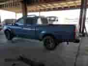 2003 Nissan Frontier XE with VIN 1N6ED29X63C443596, listed as a Copart auction lot 69464285 with 262,770 mi miles and Salvage title. Bid and sale history available at DreamBid. Image 2.