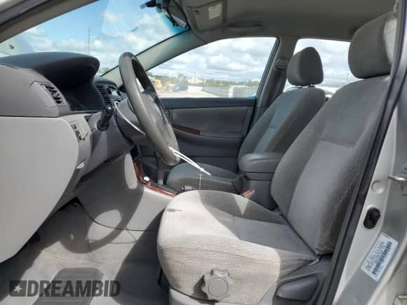 2003 Toyota Corolla CE with VIN 1NXBR32E33Z133028, listed as a Copart auction lot 71932545 with 220,264 mi miles and Clean title. Bid and sale history available at DreamBid. Image 7.