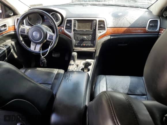 2013 Jeep Grand Cherokee Limited с VIN 1C4RJFBT4DC563944, выставлен на аукционе Copart как лот 80094825 с пробегом 204 786 миль миль и Списание • Salvage title. История ставок и продаж доступна на DreamBid. Изображение 8.